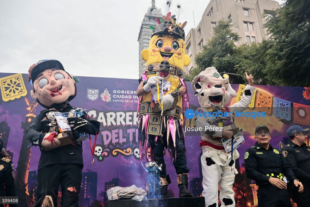 Semaforin was the winner of the second mascot race on October 24, 2026, in Mexico City, Mexico. The Mexico City Secretariat of Citizen Security held its second annual Mascot Race, which took place as part of the Day of the Dead festivities. The 52 competitors wore oversized costumes to race along one of the city’s main avenues, delighting the attendees who enjoyed watching these mascots dash toward victory. (Photo by Josue Pérez/Nexpher Images)