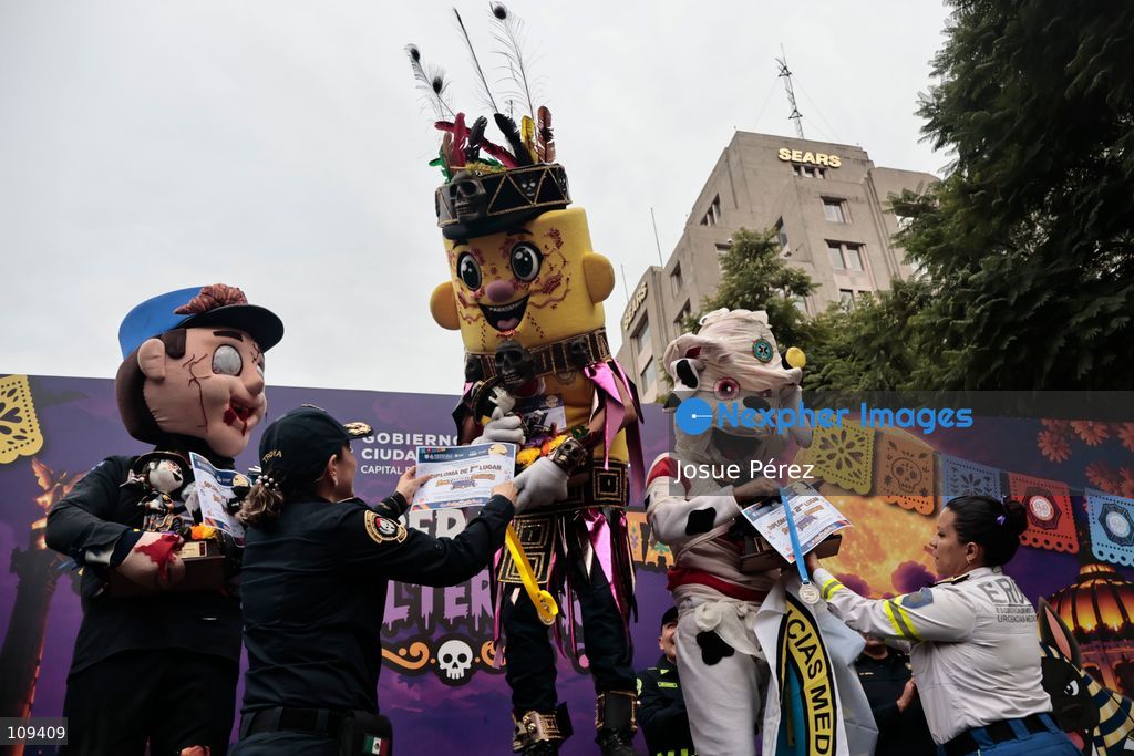 Semaforin was the winner of the second mascot race on October 24, 2026, in Mexico City, Mexico. The Mexico City Secretariat of Citizen Security held its second annual Mascot Race, which took place as part of the Day of the Dead festivities. The 52 competitors wore oversized costumes to race along one of the city’s main avenues, delighting the attendees who enjoyed watching these mascots dash toward victory. (Photo by Josue Pérez/Nexpher Images)