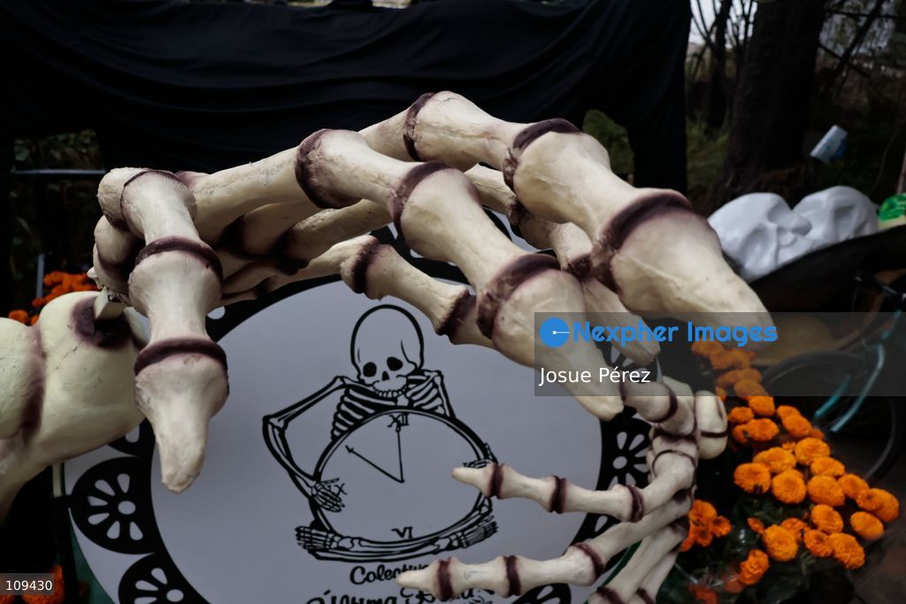 Pieces of the parade float for the Day of the Dead parade are being placed in various locations to keep them organized, on October 24, 2026, in Mexico City, Mexico. At the Arts and Trades Factory of the East (FARO de Oriente), located in the Iztapalapa district, one of the floats for the Day of the Dead parade is being constructed. Titled "Panadero con el pan" ("Baker with the Bread"), the float is being built by artisans who specialize in alebrijes (fantastical creatures) and cartonería (traditional papier-mache/cardboard craft). They are crafting skulls, calaveras (stylized skeletal figures), and pan de muerto (traditional Day of the Dead bread) to assemble the float, which will also feature cempasúchil (marigold) flowers. (Photo by Josue Pérez/Nexpher Images)