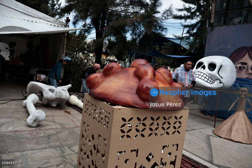Pieces of the parade float for the Day of the Dead parade are being placed in various locations to keep them organized, on October 24, 2026, in Mexico City, Mexico. At the Arts and Trades Factory of the East (FARO de Oriente), located in the Iztapalapa district, one of the floats for the Day of the Dead parade is being constructed. Titled "Panadero con el pan" ("Baker with the Bread"), the float is being built by artisans who specialize in alebrijes (fantastical creatures) and cartonería (traditional papier-mache/cardboard craft). They are crafting skulls, calaveras (stylized skeletal figures), and pan de muerto (traditional Day of the Dead bread) to assemble the float, which will also feature cempasúchil (marigold) flowers. (Photo by Josue Pérez/Nexpher Images)