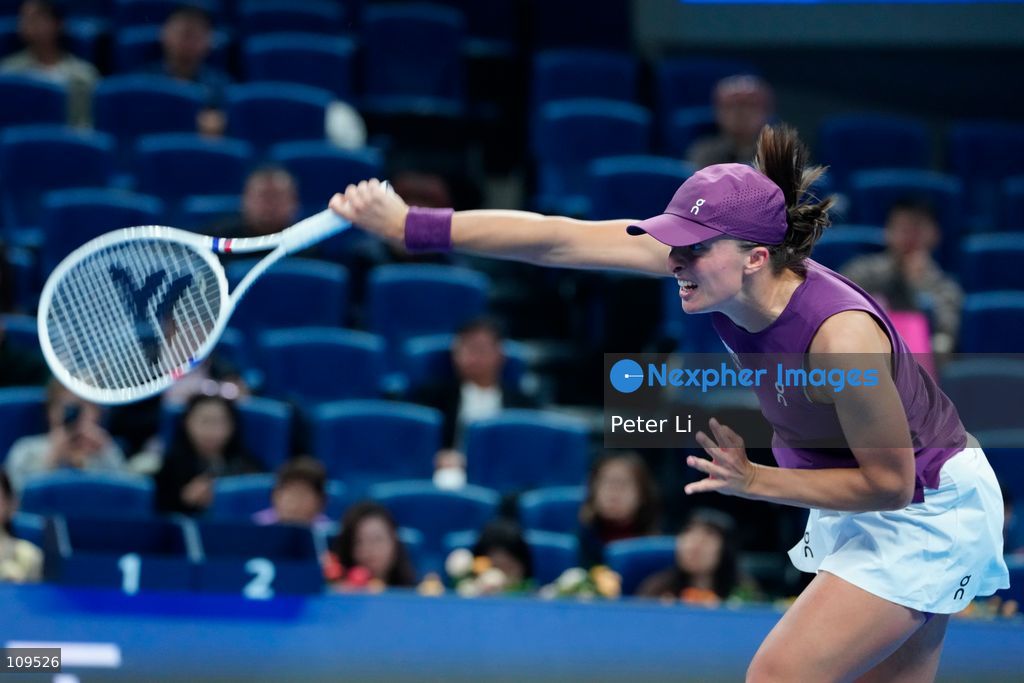 Iga Swiatek of Poland in action against Elise Mertens of Belgium during their women's singles quarter-final match on day ten of China Open at the National Tennis Center on October 9, 2026 in Beijing, China. (Photo by Peter Li/Nexpher Images)