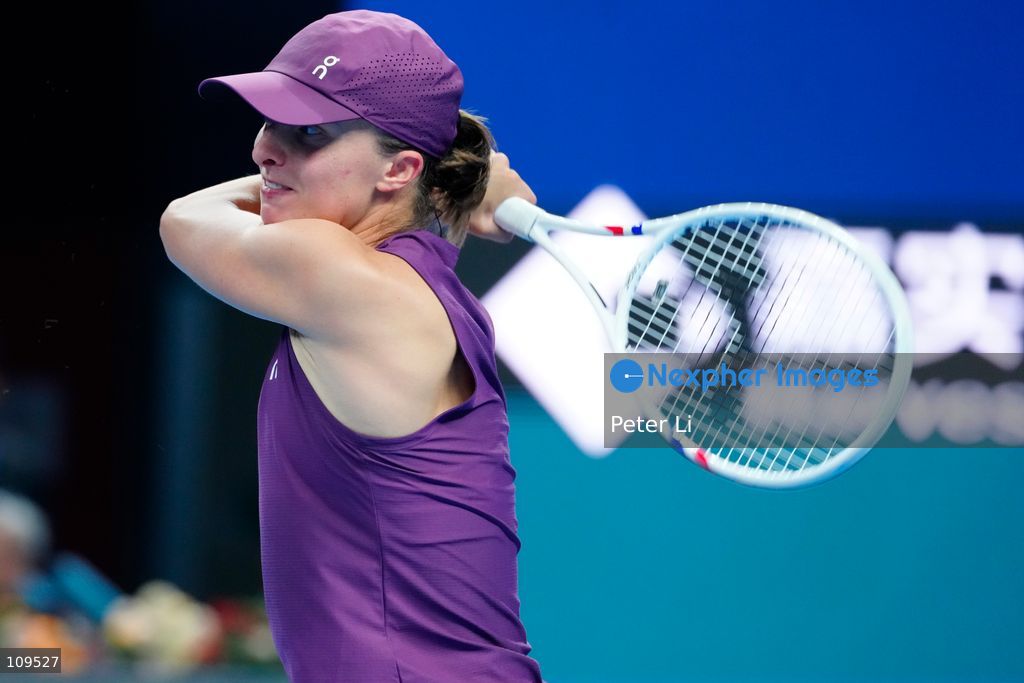Iga Swiatek of Poland in action against Elise Mertens of Belgium during their women's singles quarter-final match on day ten of China Open at the National Tennis Center on October 9, 2026 in Beijing, China. (Photo by Peter Li/Nexpher Images)