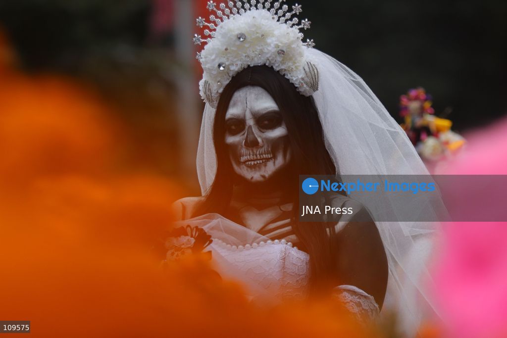 MEXICO CITY, MEXICO - OCTOBER 25, 2026: Hundreds of people dressed as skulls, alebrijes, and catrinas are participating in the 13th Mega Procession of the Catrinas at the Angel of Independence, heading toward the Zócalo in Mexico City, as part of the celebrations leading up to the Day of the Dead. (Photo by Carlos Santiago/JNA Press via Nexpher Images)
