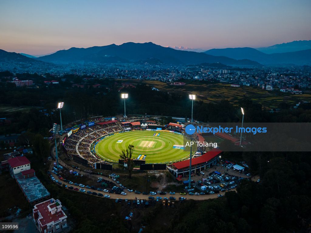 KATHMANDU, NEPAL – October 26, 2026: An aerial view shows the opening cricket match of Season 3 of the Nepal Premier League (NPL) at Tribhuvan University International Cricket Stadium in Kirtipur, Kathmandu, Nepal, on Monday. Defending champions Lumbini Lions take on Sudurpaschim Royals in the tournament opener. (Photo by AP Tolang/Nexpher Images)