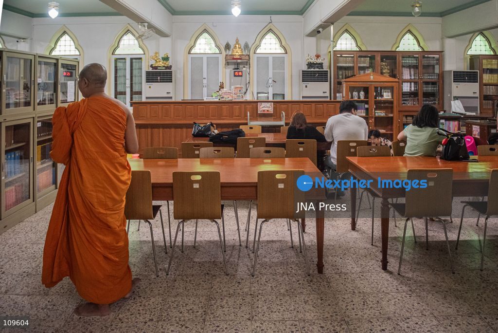 BANGKOK, THAILAND, OCTOBER 26, 2026: Visitors read and spend time with cats at Mongkolsiri Library inside Wat Paknam Phasi Charoen in Bangkok. Monks and members of the temple community care for the cats, including former strays that have found shelter on the grounds. (Photo by Ekkasit chimpinit/JNA Press via Nexpher Images)
