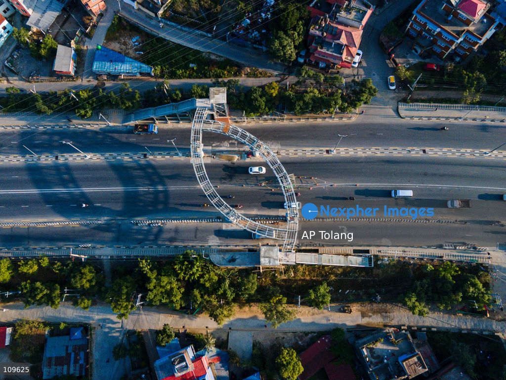 KATHMANDU, NEPAL – October 26, 2026: An aerial view shows a sky bridge with a lift under construction in its final stages at Kusunti Height in Lalitpur, Nepal. The project is nearing completion and is expected to open to the public soon, adding a new infrastructure feature to the area. (Photo by AP Tolang/Nexpher Images)