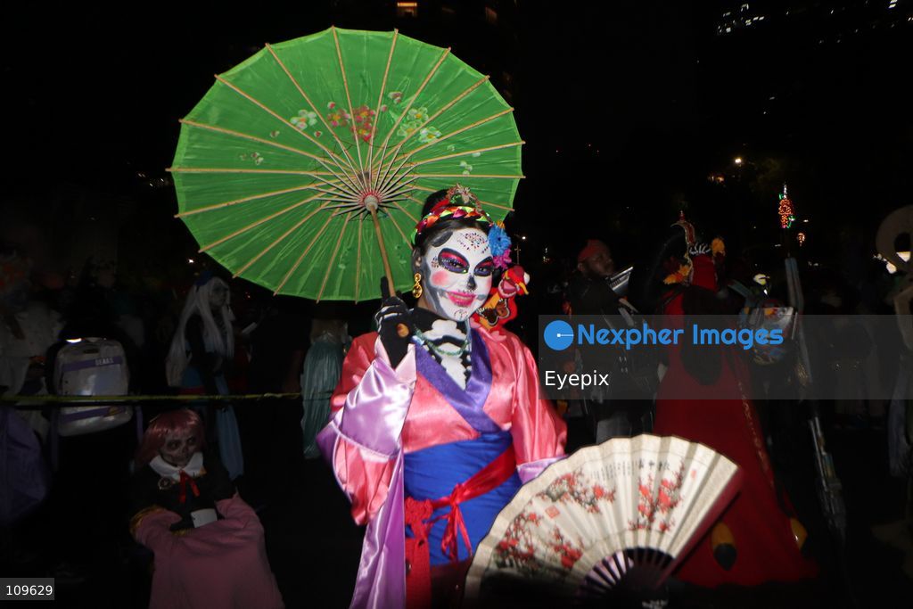 A participant dressed and painted as a traditional 'Catrina' takes part in the 13th annual Mega Procession of Catrinas along Paseo de la Reforma avenue. Thousands of persons gathered for the massive parade, a key cultural prelude to the upcoming Day of the Dead (Día de Muertos) celebrations, showcasing elaborate makeup, vibrant costumes, and honoring Mexican skull iconography. on October 25, 2026 in Mexico City, Mexico. (Photo by Carlos Santiago/ Eyepix Group/Eyepix via Nexpher Images)