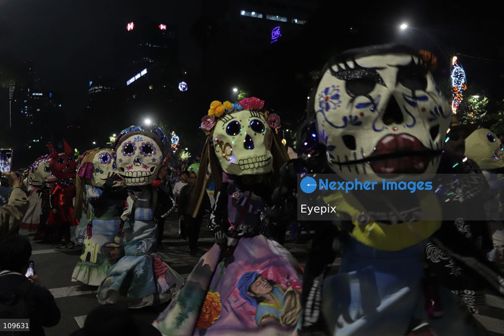 Participants take part during the 13th annual Mega Procession of Catrinas along Paseo de la Reforma avenue. Thousands of persons gathered for the massive parade, a key cultural prelude to the upcoming Day of the Dead (Día de Muertos) celebrations, showcasing elaborate makeup, vibrant costumes, and honoring Mexican skull iconography. on October 25, 2026 in Mexico City, Mexico. (Photo by Carlos Santiago/ Eyepix Group/Eyepix via Nexpher Images)