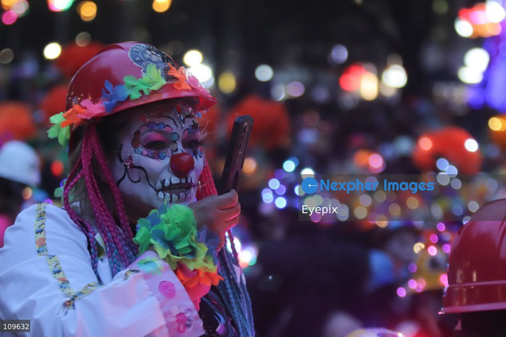 A person with her face painted with Catrina makeup takes part during the 13th annual Mega Procession of Catrinas along Paseo de la Reforma avenue. Thousands of persons gathered for the massive parade, a key cultural prelude to the upcoming Day of the Dead (Día de Muertos) celebrations, showcasing elaborate makeup, vibrant costumes, and honoring Mexican skull iconography. on October 25, 2026 in Mexico City, Mexico. (Photo by Carlos Santiago/ Eyepix Group/Eyepix via Nexpher Images)