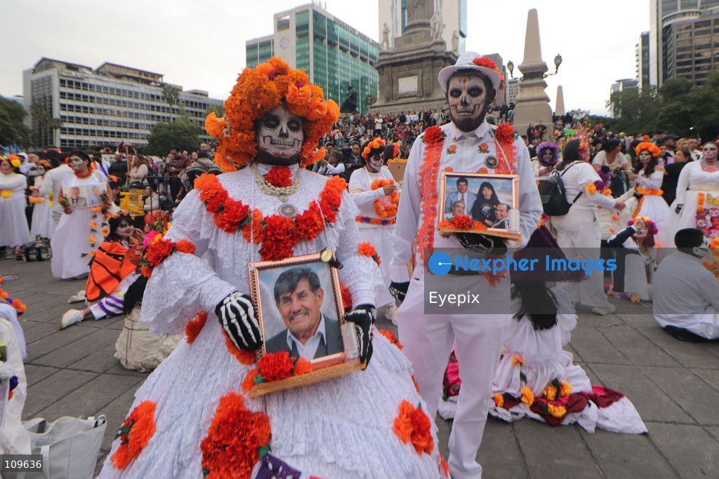 Participants dressed and painted as a traditional 'Catrina' take part during the 13th annual Mega Procession of Catrinas along Paseo de la Reforma avenue. Thousands of persons gathered for the massive parade, a key cultural prelude to the upcoming Day of the Dead (Día de Muertos) celebrations, showcasing elaborate makeup, vibrant costumes, and honoring Mexican skull iconography. on October 25, 2026 in Mexico City, Mexico. (Photo by Carlos Santiago/ Eyepix Group/Eyepix via Nexpher Images)
