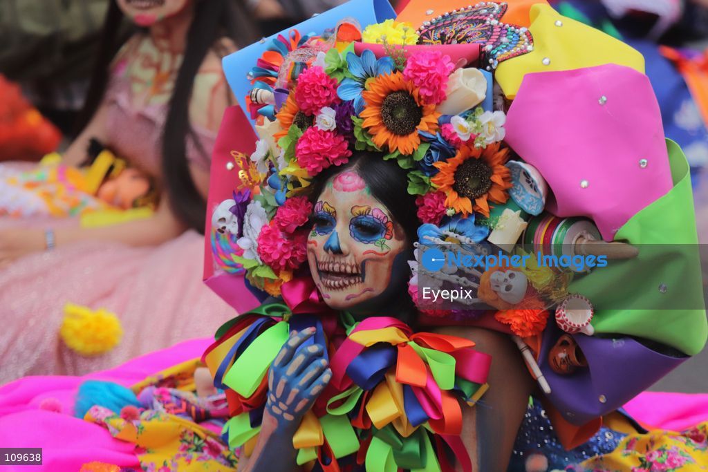 A participant dressed and painted as a traditional 'Catrina' takes part during the 13th annual Mega Procession of Catrinas along Paseo de la Reforma avenue. Thousands of persons gathered for the massive parade, a key cultural prelude to the upcoming Day of the Dead (Día de Muertos) celebrations, showcasing elaborate makeup, vibrant costumes, and honoring Mexican skull iconography. on October 25, 2026 in Mexico City, Mexico. (Photo by Carlos Santiago/ Eyepix Group/Eyepix via Nexpher Images)