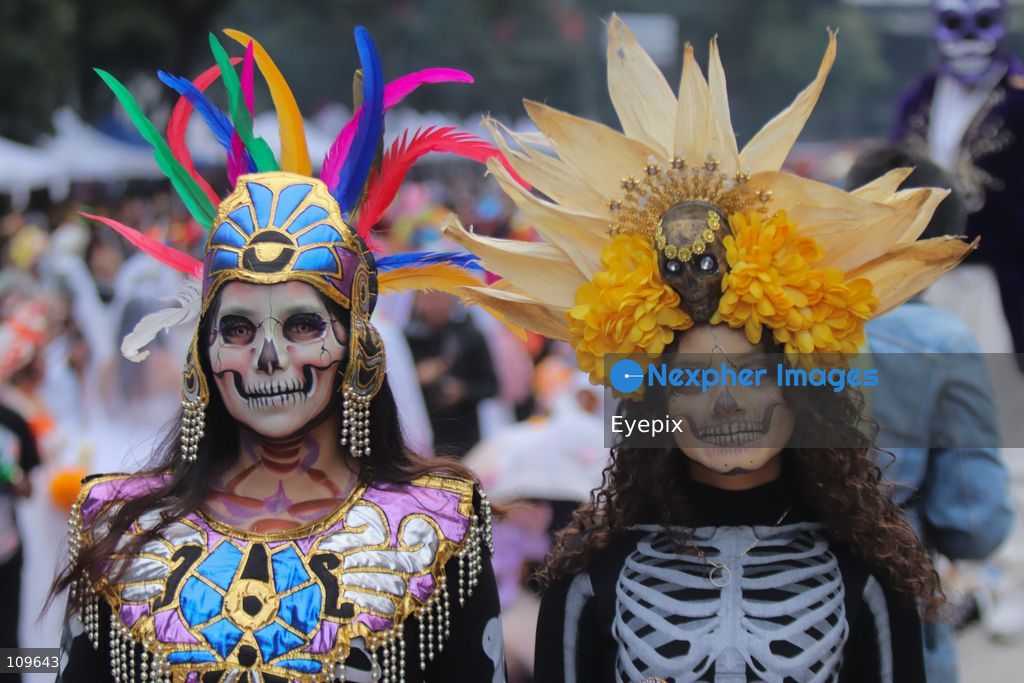 Participants dressed and painted as a traditional 'Catrina' take part during the 13th annual Mega Procession of Catrinas along Paseo de la Reforma avenue. Thousands of persons gathered for the massive parade, a key cultural prelude to the upcoming Day of the Dead (Día de Muertos) celebrations, showcasing elaborate makeup, vibrant costumes, and honoring Mexican skull iconography. on October 25, 2026 in Mexico City, Mexico. (Photo by Carlos Santiago/ Eyepix Group/Eyepix via Nexpher Images)