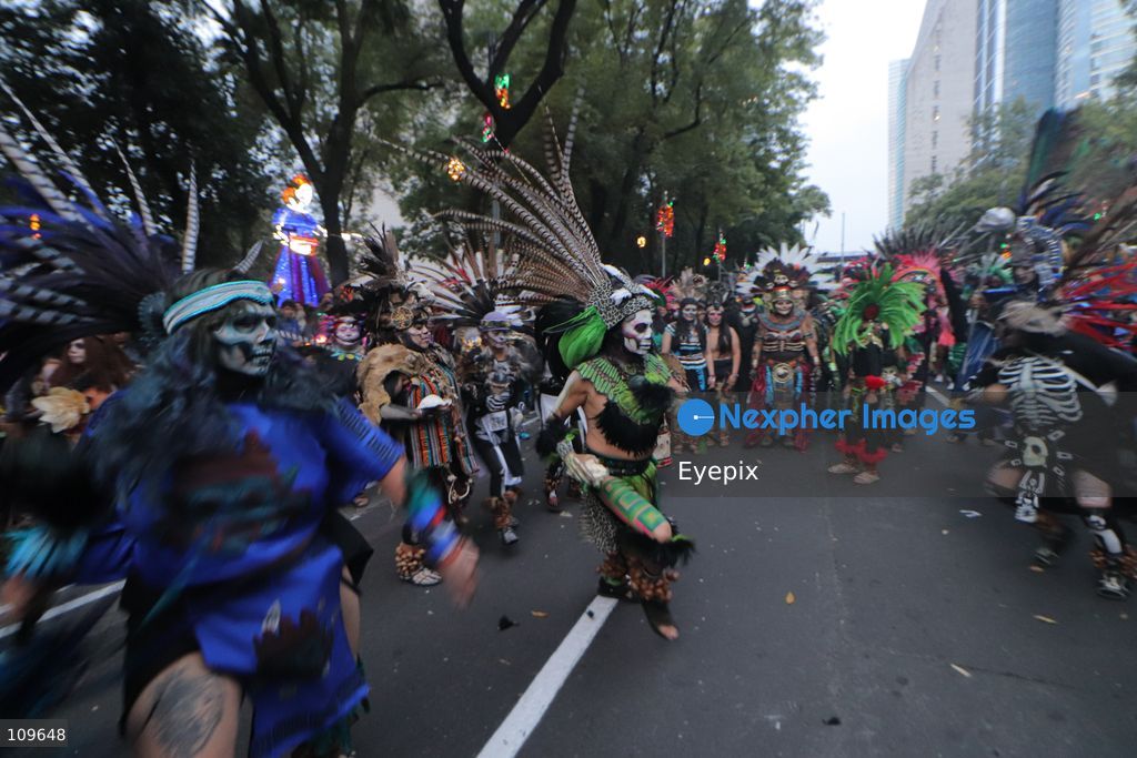 Participants dressed and painted as a traditional 'Catrina' take part during the 13th annual Mega Procession of Catrinas along Paseo de la Reforma avenue. Thousands of persons gathered for the massive parade, a key cultural prelude to the upcoming Day of the Dead (Día de Muertos) celebrations, showcasing elaborate makeup, vibrant costumes, and honoring Mexican skull iconography. on October 25, 2026 in Mexico City, Mexico. (Photo by Carlos Santiago/ Eyepix Group/Eyepix via Nexpher Images)