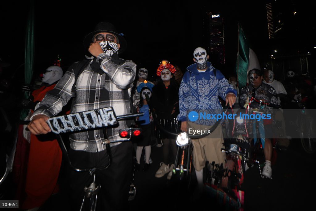 Participants take part during the 13th annual Mega Procession of Catrinas along Paseo de la Reforma avenue. Thousands of persons gathered for the massive parade, a key cultural prelude to the upcoming Day of the Dead (Día de Muertos) celebrations, showcasing elaborate makeup, vibrant costumes, and honoring Mexican skull iconography. on October 25, 2026 in Mexico City, Mexico. (Photo by Carlos Santiago/ Eyepix Group/Eyepix via Nexpher Images)