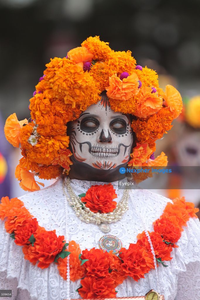 A participant dressed and painted as a traditional 'Catrina' takes part during the 13th annual Mega Procession of Catrinas along Paseo de la Reforma avenue. Thousands of persons gathered for the massive parade, a key cultural prelude to the upcoming Day of the Dead (Día de Muertos) celebrations, showcasing elaborate makeup, vibrant costumes, and honoring Mexican skull iconography. on October 25, 2026 in Mexico City, Mexico. (Photo by Carlos Santiago/ Eyepix Group/Eyepix via Nexpher Images)