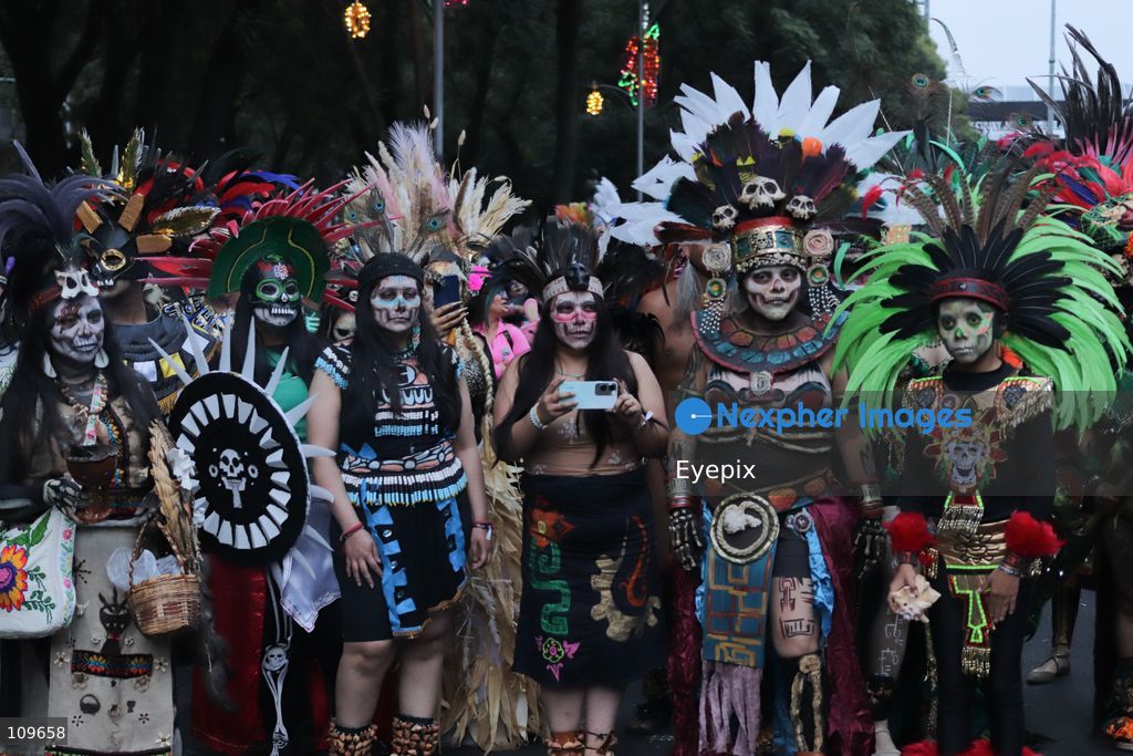 Participants dressed and painted as a traditional 'Catrina' take part during the 13th annual Mega Procession of Catrinas along Paseo de la Reforma avenue. Thousands of persons gathered for the massive parade, a key cultural prelude to the upcoming Day of the Dead (Día de Muertos) celebrations, showcasing elaborate makeup, vibrant costumes, and honoring Mexican skull iconography. on October 25, 2026 in Mexico City, Mexico. (Photo by Carlos Santiago/ Eyepix Group/Eyepix via Nexpher Images)