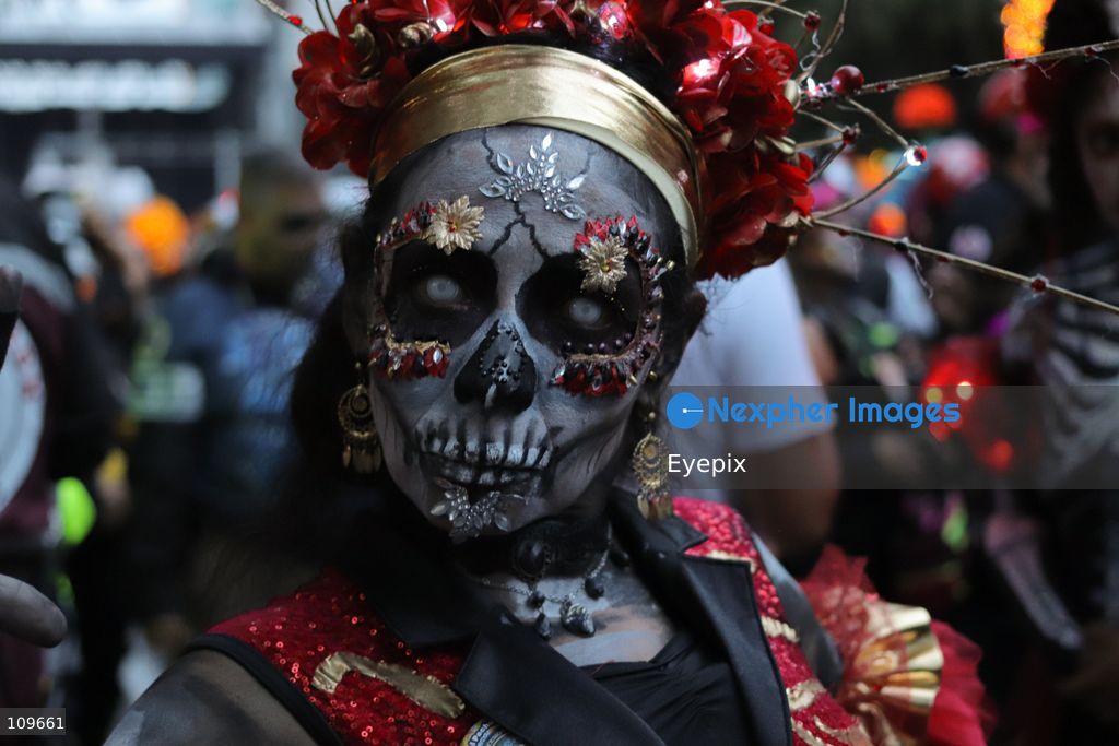 A participant dressed and painted as a traditional 'Catrina' takes part during the 13th annual Mega Procession of Catrinas along Paseo de la Reforma avenue. Thousands of persons gathered for the massive parade, a key cultural prelude to the upcoming Day of the Dead (Día de Muertos) celebrations, showcasing elaborate makeup, vibrant costumes, and honoring Mexican skull iconography. on October 25, 2026 in Mexico City, Mexico. (Photo by Carlos Santiago/ Eyepix Group/Eyepix via Nexpher Images)