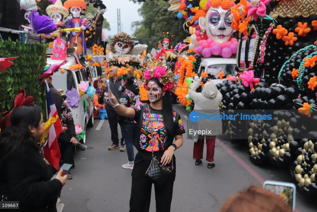 Participants take part during the 13th annual Mega Procession of Catrinas along Paseo de la Reforma avenue. Thousands of persons gathered for the massive parade, a key cultural prelude to the upcoming Day of the Dead (Día de Muertos) celebrations, showcasing elaborate makeup, vibrant costumes, and honoring Mexican skull iconography. on October 25, 2026 in Mexico City, Mexico. (Photo by Carlos Santiago/ Eyepix Group/Eyepix via Nexpher Images)