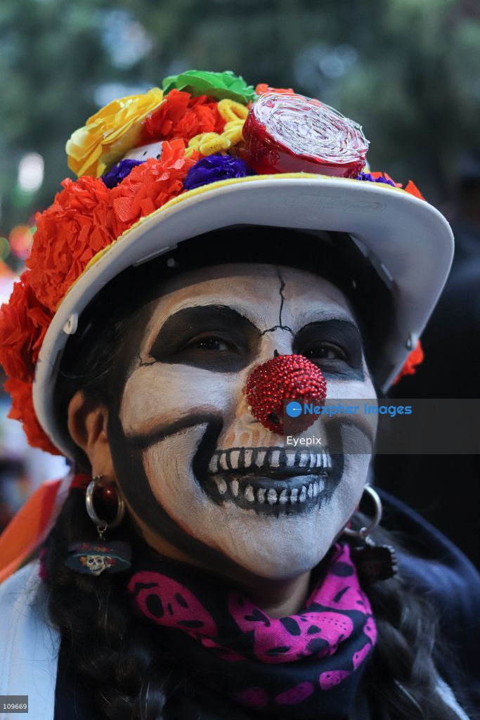 A woman with her face painted with Catrina makeup takes part during the 13th annual Mega Procession of Catrinas along Paseo de la Reforma avenue. Thousands of persons gathered for the massive parade, a key cultural prelude to the upcoming Day of the Dead (Día de Muertos) celebrations, showcasing elaborate makeup, vibrant costumes, and honoring Mexican skull iconography. on October 25, 2026 in Mexico City, Mexico. (Photo by Carlos Santiago/ Eyepix Group/Eyepix via Nexpher Images)