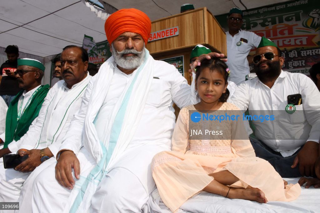 PRAYAGRAJ, INDIA, OCTOBER 26, 2026: Rakesh Tikait, national spokesperson of the Bharatiya Kisan Union (BKU), joins farmers during a Kisan Mahapanchayat gathering at Mundera Mandi in Prayagraj, Uttar Pradesh. Participants demand fair crop prices, adequate agricultural supplies and fair compensation for land acquired for development projects. (Photo by Saurabh Kumar/JNA Press via Nexpher Images)