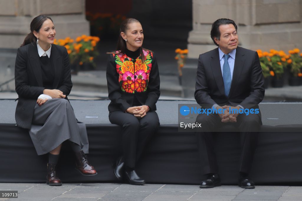 (L-R) Secretary of Culture Claudia Curiel de Icaza, Mexican President Claudia Sheinbaum and Secretary of Public Education Mario Delgado attend the presentation of the first National School Choir Contest (Primer Concurso Nacional de Coros Escolares) inside the Main Patio at the National Palace on October 26, 2026 in Mexico City, Mexico. (Photo by Carlos Santiago/ Eyepix Group/Eyepix via Nexpher Images)