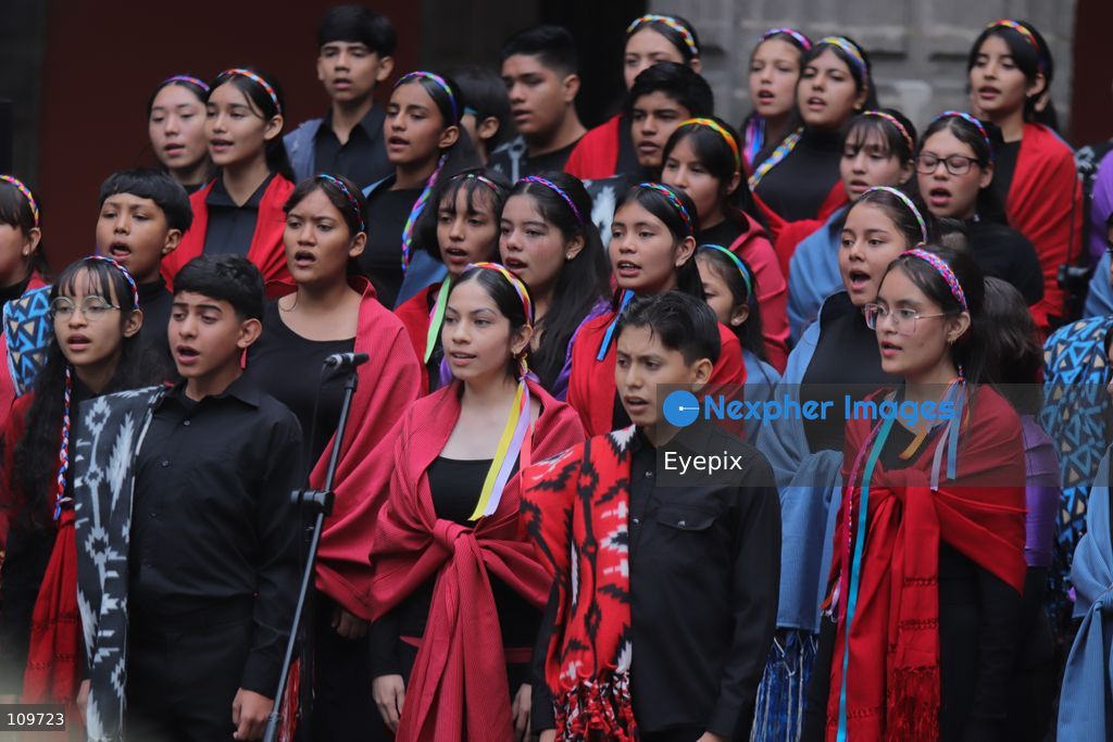 Children from a school choir, dressed in traditional regional costumes sing during the presentation of the first National School Choir Contest (Primer Concurso Nacional de Coros Escolares) inside the Main Patio at the National Palace on October 26, 2026 in Mexico City, Mexico. (Photo by Carlos Santiago/ Eyepix Group/Eyepix via Nexpher Images)