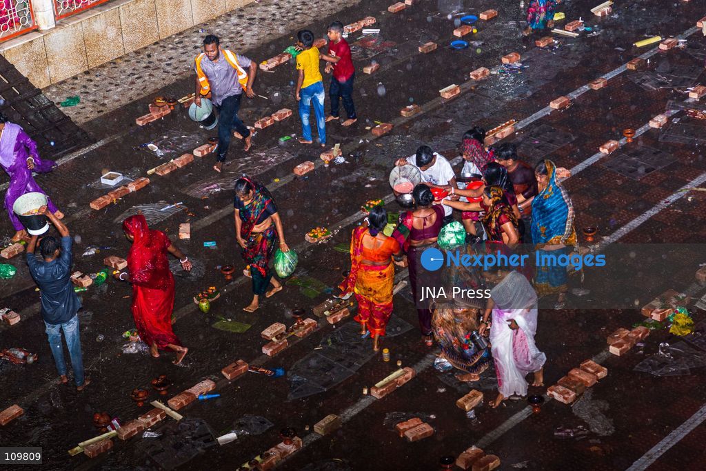 DHAKA, BANGLADESH - OCTOBER 27, 2026: Hindu devotees pray during Rakher Upobash, a fasting festival held during the month of Kartik, at the Shri Shri Lokenath Brahmachari Ashram temple. (Photo by Sohel Chowdhury/JNA Press via Nexpher Images)