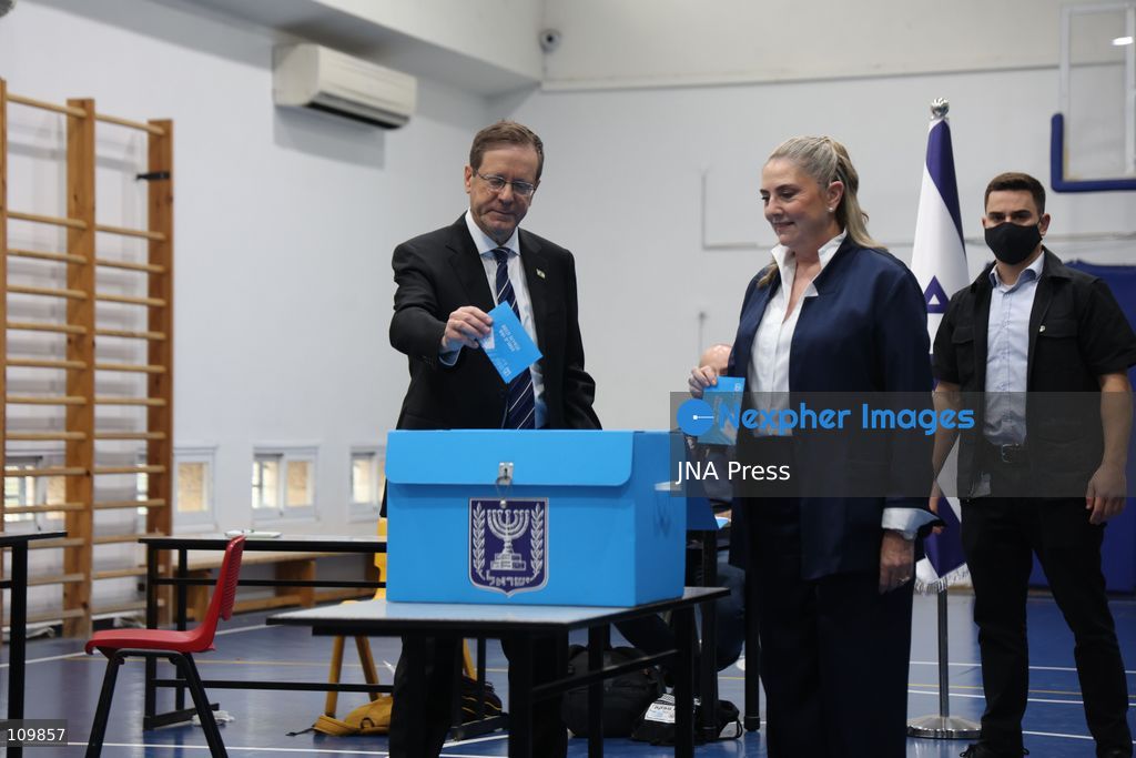 WEST JERUSALEM, OCTOBER 27, 2026: Israeli President Isaac Herzog and voters cast their ballots at a polling station in West Jerusalem during elections for Israel’s parliament, the Knesset. (Photo by Saeed Qaq/JNA Press via Nexpher Images)