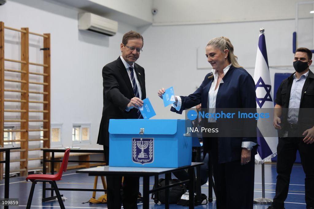 WEST JERUSALEM, OCTOBER 27, 2026: Israeli President Isaac Herzog and voters cast their ballots at a polling station in West Jerusalem during elections for Israel’s parliament, the Knesset. (Photo by Saeed Qaq/JNA Press via Nexpher Images)