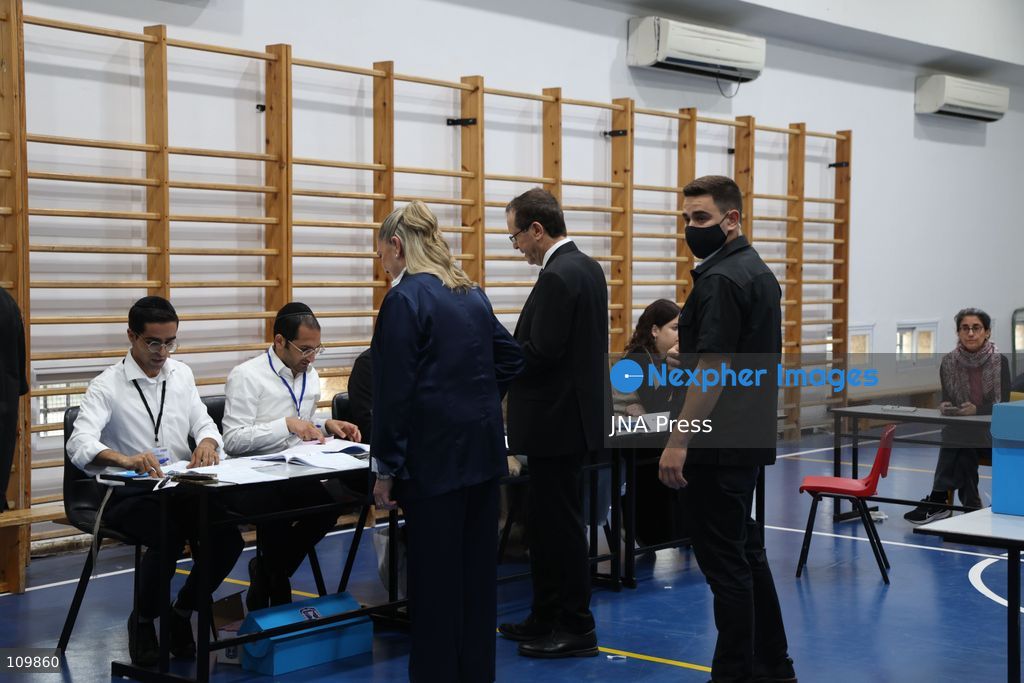 WEST JERUSALEM, OCTOBER 27, 2026: Israeli President Isaac Herzog and voters cast their ballots at a polling station in West Jerusalem during elections for Israel’s parliament, the Knesset. (Photo by Saeed Qaq/JNA Press via Nexpher Images)