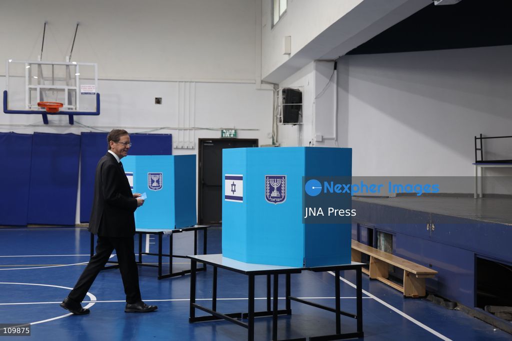 WEST JERUSALEM, OCTOBER 27, 2026: Israeli President Isaac Herzog and voters cast their ballots at a polling station in West Jerusalem during elections for Israel’s parliament, the Knesset. (Photo by Saeed Qaq/JNA Press via Nexpher Images)
