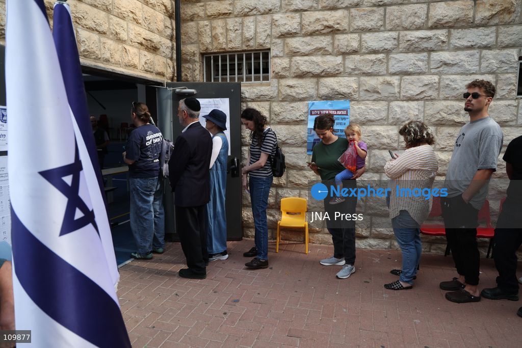WEST JERUSALEM, OCTOBER 27, 2026: Israeli President Isaac Herzog and voters cast their ballots at a polling station in West Jerusalem during elections for Israel’s parliament, the Knesset. (Photo by Saeed Qaq/JNA Press via Nexpher Images)