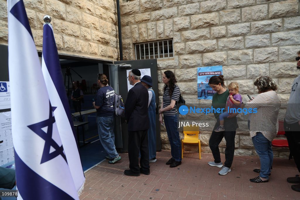 WEST JERUSALEM, OCTOBER 27, 2026: Israeli President Isaac Herzog and voters cast their ballots at a polling station in West Jerusalem during elections for Israel’s parliament, the Knesset. (Photo by Saeed Qaq/JNA Press via Nexpher Images)
