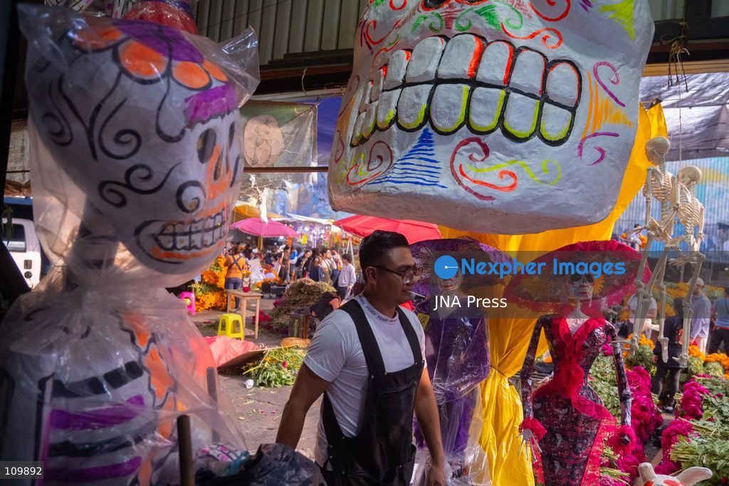 MEXICO CITY, MEXICO - OCTOBER 26, 2026: Cempasúchil flowers and cardboard skulls are displayed for sale at the Jamaica Market in Mexico City ahead of Day of the Dead, to be used to decorate altars. (Photo by Marco Tulio gonzalez rodriguez/JNA Press via Nexpher Images)