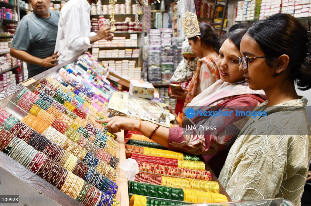 PRAYAGRAJ, INDIA - OCTOBER 27, 2026: A woman buys bangles ahead of the upcoming Karwa Chauth festival in Prayagraj. (Photo by Saurabh Kumar/JNA Press via Nexpher Images)