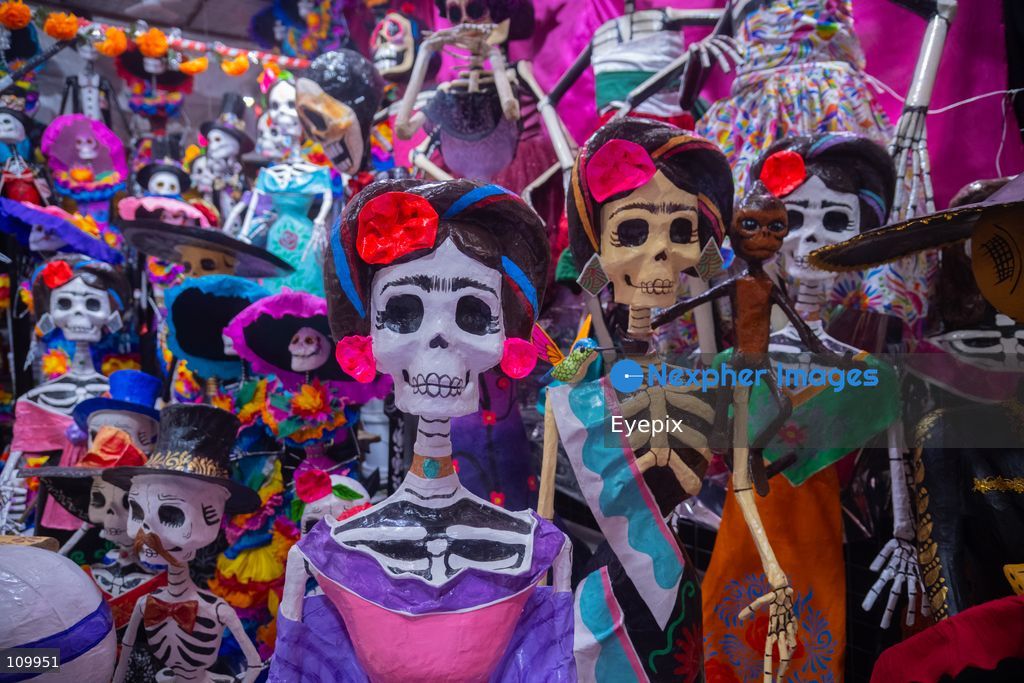 Handcrafted papier-mâché skeletons and Catrinas, are displayed for sale to customers preparing for the upcoming Day of the Dead (Dia de Muertos) celebrations at the Jamaica Market on October 26, 2026 in Mexico City, Mexico. The traditional market experiences a massive influx of shoppers sourcing flowers, incense, sugar skulls, and altar decorations to honor their deceased loved ones ahead of the annual holiday celebrated on November 1 and 2. (Photo by Marko Gonzalez/ Eyepix Group/Eyepix via Nexpher Images)