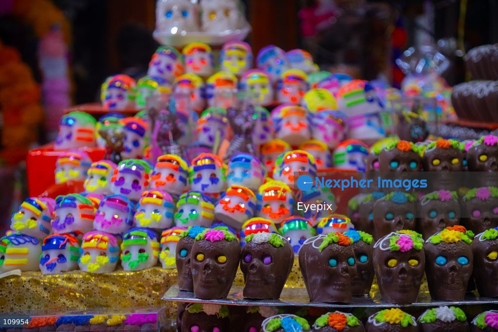 Stalls display traditional sugar and chocolate skulls (calaveras de dulce y chocolate) for sale ahead of the upcoming Day of the Dead (Dia de Muertos) celebrations at the Jamaica Market on October 26, 2026 in Mexico City, Mexico. The traditional market experiences a massive influx of shoppers sourcing flowers, incense, sugar skulls, and altar decorations to honor their deceased loved ones ahead of the annual holiday celebrated on November 1 and 2. (Photo by Marko Gonzalez/ Eyepix Group/Eyepix via Nexpher Images)