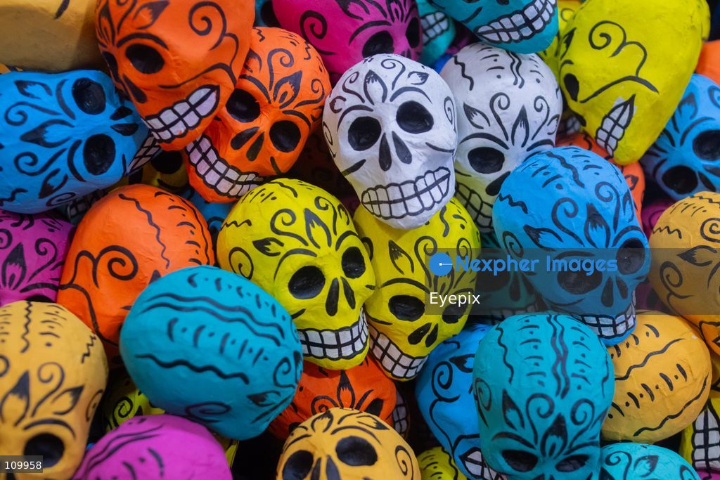 Handcrafted papier-mâché skulls, are displayed for sale to customers preparing for the upcoming Day of the Dead (Dia de Muertos) celebrations at the Jamaica Market on October 26, 2026 in Mexico City, Mexico. The traditional market experiences a massive influx of shoppers sourcing flowers, incense, sugar skulls, and altar decorations to honor their deceased loved ones ahead of the annual holiday celebrated on November 1 and 2. (Photo by Marko Gonzalez/ Eyepix Group/Eyepix via Nexpher Images)
