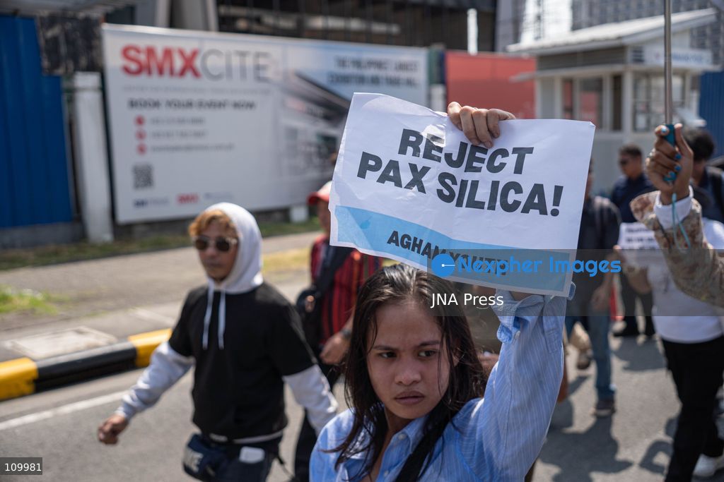 PASAY CITY, PHILIPPINES, OCTOBER 27, 2026: Environmental activists protest against Executive Order 122 and the US-led Pax Silica initiative during the Mining Philippines 2026 conference in Pasay City. Demonstrators call for the order’s repeal, warning that expanded mineral extraction threatens the environment and local communities. The order designates critical mineral projects as national priorities and accelerates the privatization of government-owned critical mineral mining assets. (Photo by Charles Edmon S. Perez/JNA Press via Nexpher Images)
