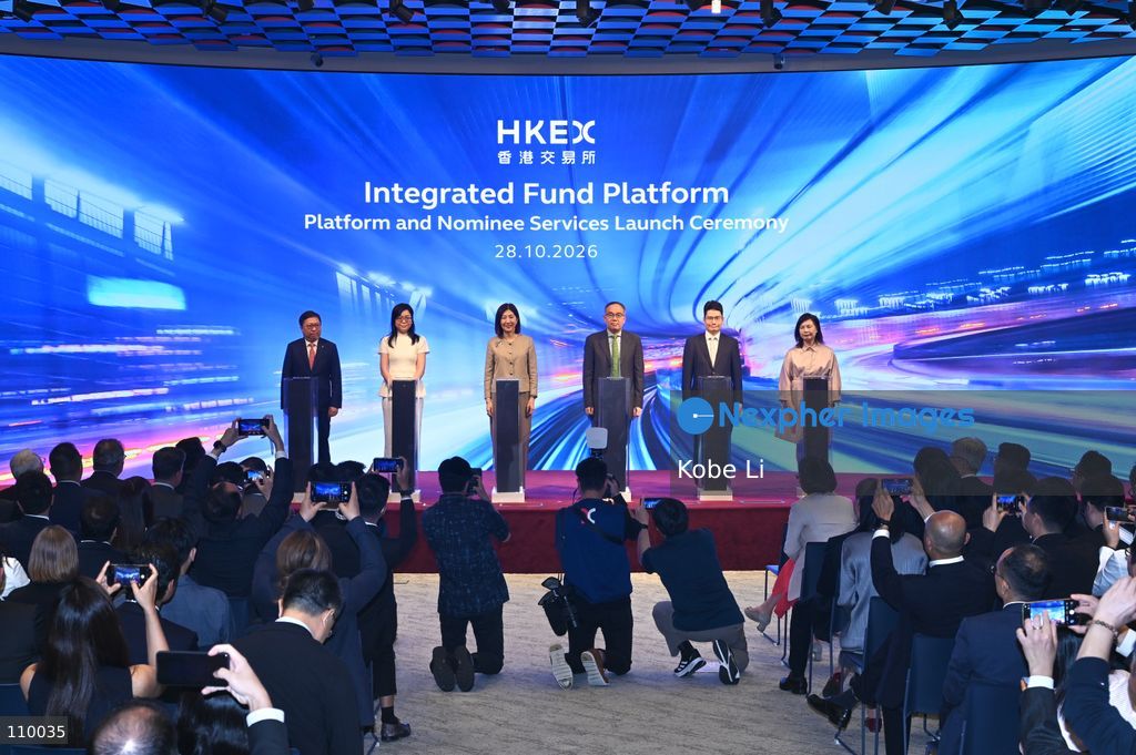 Christopher Hui, Secretary for Financial Services and the Treasury of Hong Kong, Bonnie Yiting Chan, CEO of Hong Kong Exchanges and Clearing Limited, posing photo at Integrated Fund Platform Services Launch Ceremony on October 28, 2026 in Hong Kong. (Photo by Kobe Li/Nexpher Images)