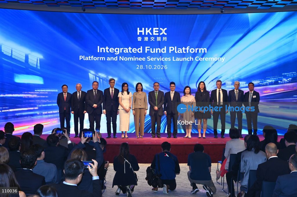Christopher Hui, Secretary for Financial Services and the Treasury of Hong Kong, Bonnie Yiting Chan, CEO of Hong Kong Exchanges and Clearing Limited, posing photo at Integrated Fund Platform Services Launch Ceremony on October 28, 2026 in Hong Kong. (Photo by Kobe Li/Nexpher Images)