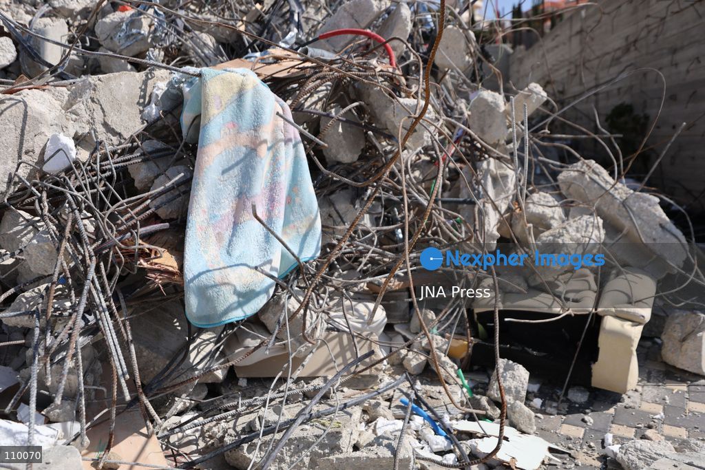 HEBRON, PALESTINE, OCTOBER 28, 2026: Dr. Mayar Marish, 23, stands with her husband, Ahmad Marish, outside the rubble of her family’s home in the Farsh al-Hawa area of Hebron in the occupied West Bank. Israeli forces demolished the home on October 23, displacing her family. Mayar had planned to hold her wedding celebration at the house in ten days. (Photo by Mosab shawer/JNA Press via Nexpher Images)