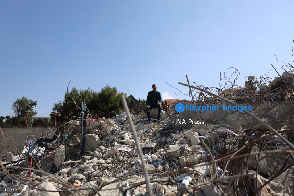 HEBRON, PALESTINE, OCTOBER 28, 2026: Dr. Mayar Marish, 23, stands with her husband, Ahmad Marish, outside the rubble of her family’s home in the Farsh al-Hawa area of Hebron in the occupied West Bank. Israeli forces demolished the home on October 23, displacing her family. Mayar had planned to hold her wedding celebration at the house in ten days. (Photo by Mosab shawer/JNA Press via Nexpher Images)