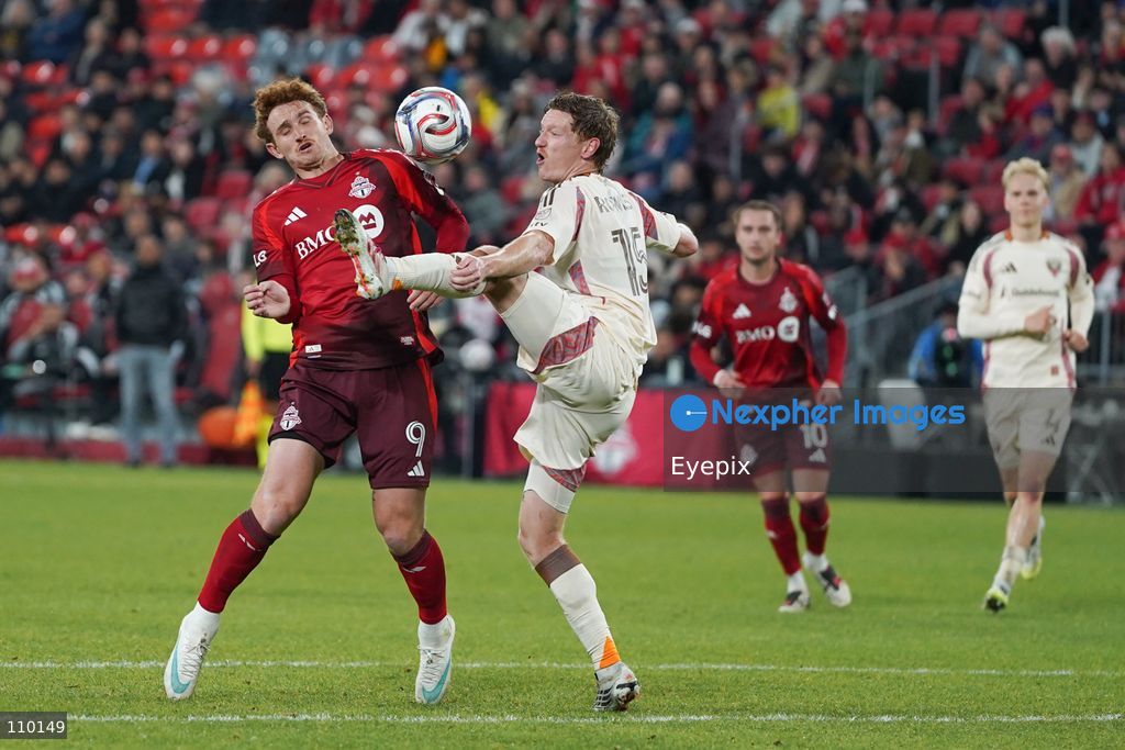 Josh Sargent #09 of Toronto FC and Kye Rowles #15 of D.C. United battle for the ball during the Major League Soccer Match between Toronto FC and DC United at BMO Field Stadium. on October 28, 2026 in Toronto, Canada. (Photo by Leonardo Ramirez / Eyepix Group/Eyepix via Nexpher Images)