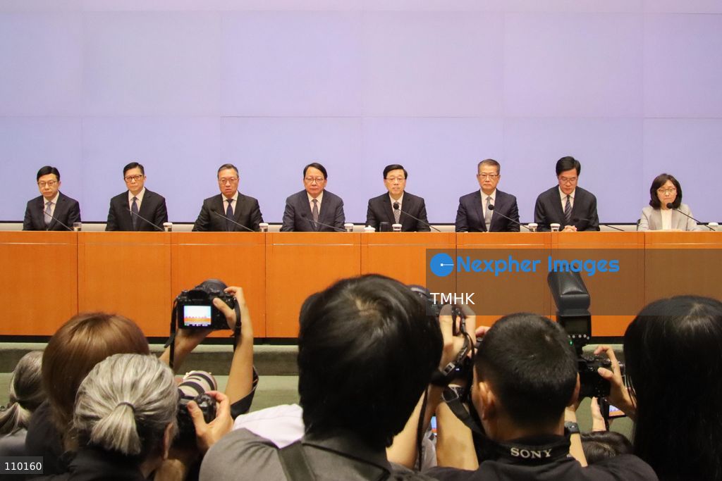 Hong Kong Chief Executive John Lee Ka-chiu and seven senior government officials address the media during a press conference on the release of the independent inquiry report into the Wang Fuk Court fire in Tai Po, at the Central Government Offices in Hong Kong on October 29, 2026. Lee announces that he has accepted Secretary for Housing Winnie Ho's resignation to assume political responsibility for regulatory failures identified in the report. (Photo by Gordon Choi/TMHK via Nexpher Images)