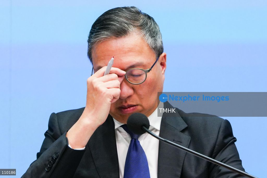 Hong Kong Secretary for Justice Paul Lam Ting-kwok adjusts his glasses during a government press conference on the independent inquiry report into the Wang Fuk Court fire at the Central Government Offices in Hong Kong on October 29, 2026. (Photo by Zulu Lo/TMHK via Nexpher Images)