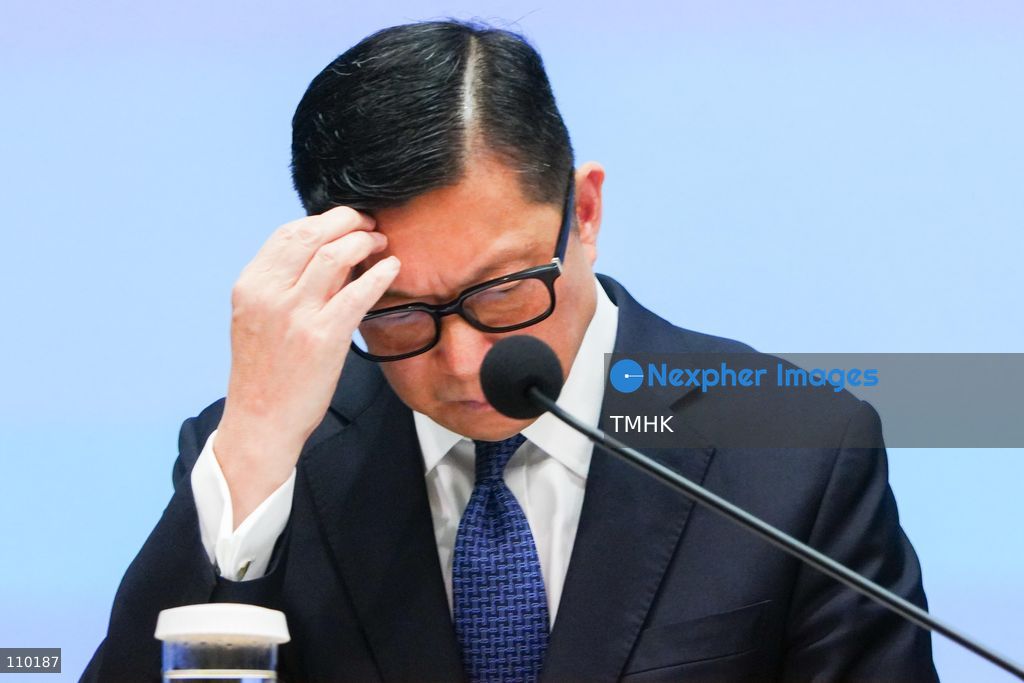 Hong Kong Secretary for Security Chris Tang Ping-keung scratches his head during a government press conference on the independent inquiry report into the Wang Fuk Court fire at the Central Government Offices in Hong Kong on October 29, 2026. (Photo by Zulu Lo/TMHK via Nexpher Images)