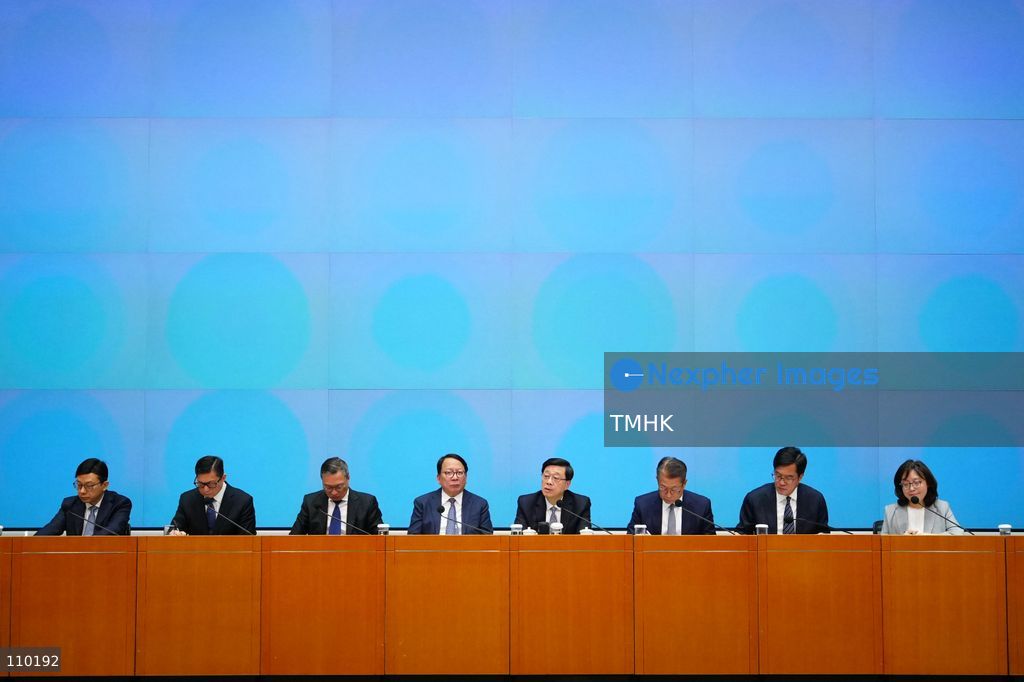 Hong Kong Chief Executive John Lee Ka-chiu answers questions from reporters at the podium during a government press conference on the independent inquiry report into the deadly Wang Fuk Court fire at the Central Government Offices in Hong Kong on October 29, 2026. (Photo by Zulu Lo/TMHK via Nexpher Images)