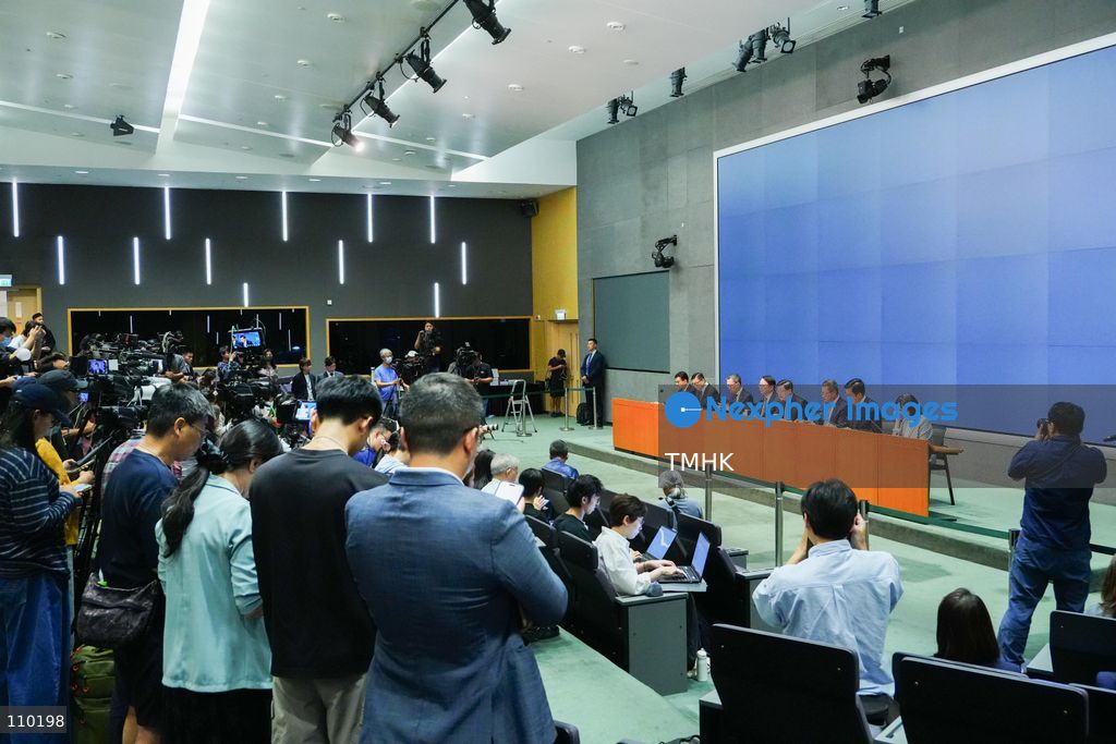 A large number of journalists cover a government press conference on the release of the independent inquiry report into the deadly Wang Fuk Court fire at the Central Government Offices in Hong Kong on October 29, 2026. (Photo by Zulu Lo/TMHK via Nexpher Images)