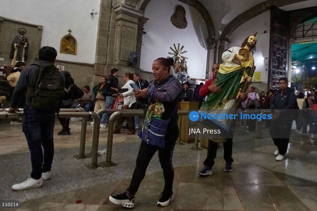 MEXICO CITY, MEXICO - OCTOBER 28, 2026: Believers and worshippers visit the Church of San Hipólito to celebrate the feast day of Saint Jude Thaddeus. Participants carry images and paintings of the saint and wear attire associated with him. (Photo by Juan Perez Puente/JNA Press via Nexpher Images)